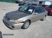 ✅ 2001 Toyota Corolla CE • VIN: 2T1BR18E41C473850 • Lot: 43431234. Listed on IAAI with 140,000 mi. Free auction sales archive from the USA and detailed vehicle history report at DreamBid. Image 2.