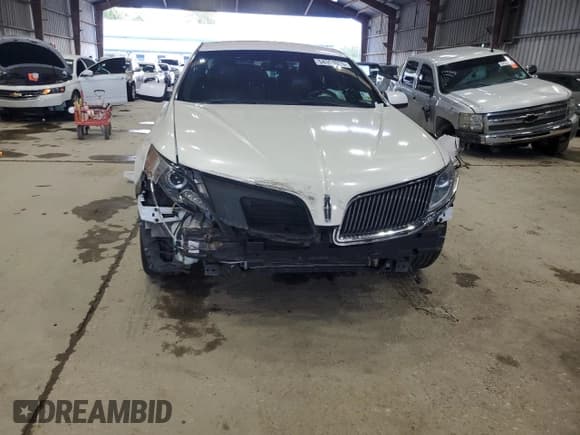 ✅ 2013 Lincoln MKS • VIN: 1LNHL9DK4DG613144 • Lot: 54354625. Listed on Copart with 104,211 mi. Free auction sales archive from the USA and detailed vehicle history report at DreamBid. Image 5.