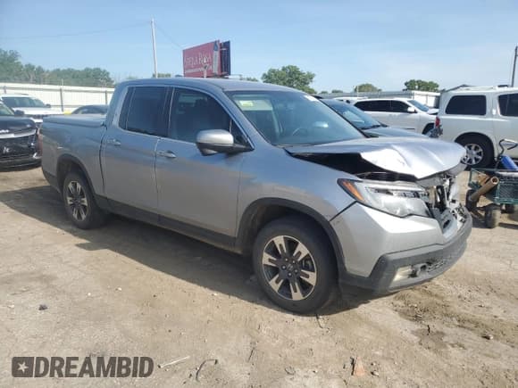 ✅ 2018 Honda Ridgeline RTL-T • VIN: 5FPYK3F67JB011730 • Lot: 61055715. Listed on Copart with 121,193 mi. Free auction sales archive from the USA and detailed vehicle history report at DreamBid. Image 4.