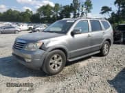 ✅ 2009 Kia Borrego EX • VIN: KNDJJ741795027323 • Лот: 71418955. Опубликован ранее на Copart с пробегом 191 969 миль. Бесплатный доступ к архиву аукционных продаж из США и подробный отчёт об истории автомобиля на DreamBid. Изображение 1.