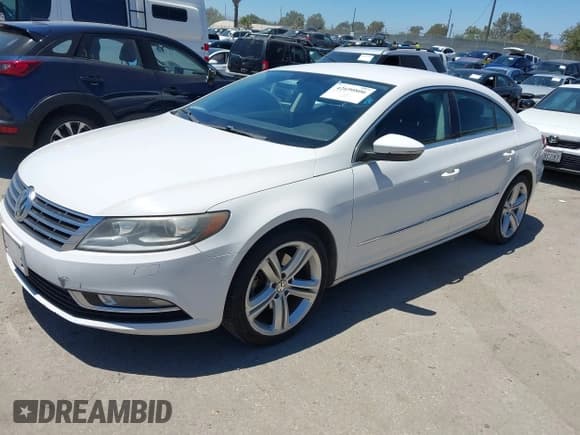 ✅ 2013 Volkswagen CC R-Line • VIN: WVWBP7AN0DE510087 • Lot: 42690806. Listed on IAAI with 125,738 mi. Free auction sales archive from the USA and detailed vehicle history report at DreamBid. Image 2.