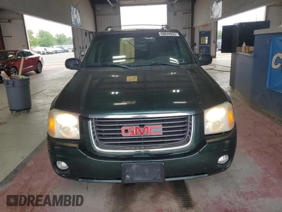 ✅ 2004 GMC Envoy SLE • VIN: 1GKDT13S342140960 • Лот: 68049835. Опубликован ранее на Copart с пробегом 287 399 миль. Бесплатный доступ к архиву аукционных продаж из США и подробный отчёт об истории автомобиля на DreamBid. Изображение 5.