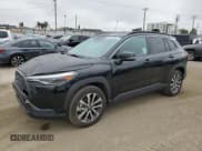 ✅ 2023 Toyota Corolla Cross XLE • VIN: 7MUDAABG6PV048792 • Lot: 59635505. Listed on Copart with 59,189 mi. Free auction sales archive from the USA and detailed vehicle history report at DreamBid. Image 1.