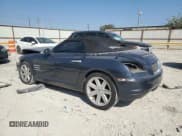 ✅ 2006 Chrysler Crossfire Limited • VIN: 1C3AN65L86X066358 • Lot: 76327594. Listed on Copart with 147,725 mi. Free auction sales archive from the USA and detailed vehicle history report at DreamBid. Image 2.