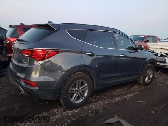 ✅ 2018 Hyundai Santa Fe 2.4L • VIN: 5XYZUDLB9JG513159 • Лот: 79037833. Опубликован ранее на Copart с пробегом 65 867 миль. Бесплатный доступ к архиву аукционных продаж из США и подробный отчёт об истории автомобиля на DreamBid. Изображение 3.