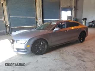 ✅ 2017 Audi A7 Premium Plus • VIN: WAUW2AFCXHN050248 • Lot: 81092725. Listed on Copart with 98,443 mi. Free auction sales archive from the USA and detailed vehicle history report at DreamBid. Image 1.
