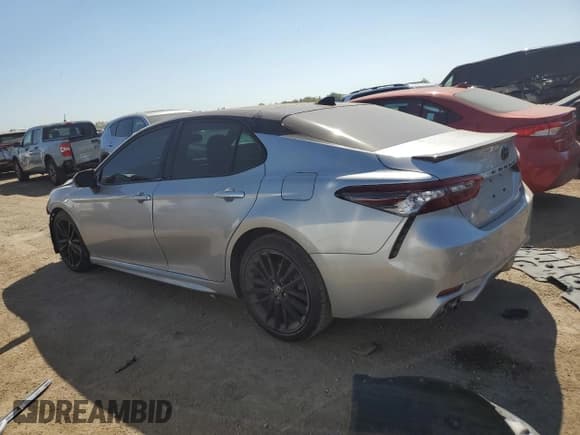 ✅ 2023 Toyota Camry TRD • VIN: 4T1KZ1AK2PU077827 • Lot: 81846545. Listed on Copart with 59,018 mi. Free auction sales archive from the USA and detailed vehicle history report at DreamBid. Image 2.
