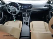 ✅ 2021 Volkswagen Jetta SEL • VIN: 3VWE57BU5MM013374 • Лот: 58579395. Опубликован ранее на Copart с пробегом 50 968 миль. Бесплатный доступ к архиву аукционных продаж из США и подробный отчёт об истории автомобиля на DreamBid. Изображение 8.