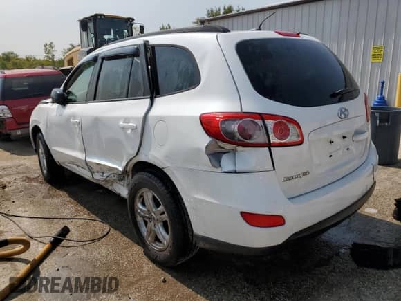 2012 Hyundai Santa Fe GLS с VIN 5XYZG3AB5CG134120, выставлен на аукционе Copart как лот 70640204 с пробегом Не указан миль и Списание • Salvage title. История ставок и продаж доступна на DreamBid. Изображение 2.