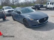 ✅ 2024 Mazda 3 S Carbon Edition • VIN: 3MZBPBCM3RM416565 • Lot: 42047841. Listed on IAAI with 11,074 mi. Free auction sales archive from the USA and detailed vehicle history report at DreamBid. Image 1.