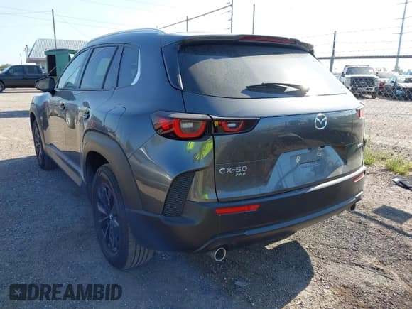 ✅ 2025 Mazda CX-50 S Preferred • VIN: 7MMVABBMXSN325856 • Lot: 42893152. Listed on IAAI with 7,482 mi. Free auction sales archive from the USA and detailed vehicle history report at DreamBid. Image 3.