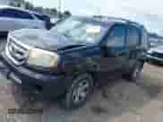 2010 Honda Pilot LX with VIN 5FNYF4H20AB025885, listed as a IAAI auction lot 42549583 with 172,341 mi miles and . Bid and sale history available at DreamBid. Image 2.