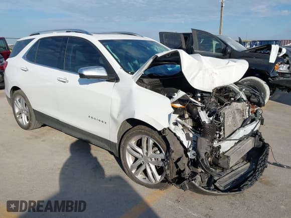 ✅ 2020 Chevrolet Equinox Premier • VIN: 3GNAXNEV3LS731737 • Лот: 43341236. Опубликован ранее на IAAI с пробегом 32 534 миль. Бесплатный доступ к архиву аукционных продаж из США и подробный отчёт об истории автомобиля на DreamBid. Изображение 1.