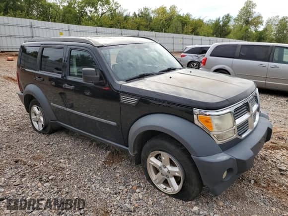 2007 Dodge Nitro SXT с VIN 1D8GU28K27W601732, выставлен на аукционе Copart как лот 72654904 с пробегом 123 249 миль миль и Списание • Salvage title. История ставок и продаж доступна на DreamBid. Изображение 4.