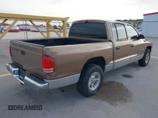✅ 2000 Dodge Dakota Sport • VIN: 1B7GL2AZ8YS716918 • Lot: 42467015. Wystawiony na IAAI z przebiegiem 149 961 mil. Bezpłatny archiwum sprzedaży aukcyjnych z USA i szczegółowy raport historii pojazdu na DreamBid. Zdjęcie 4.
