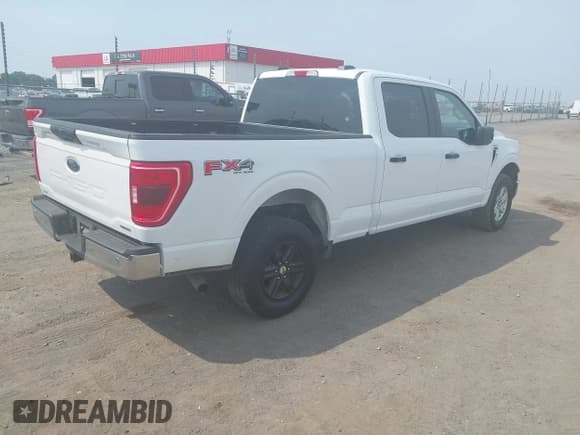 ✅ 2022 Ford F-150 XL • VIN: 1FTFW1E86NFB57498 • Lot: 43223589. Listed on IAAI with 63,536 mi. Free auction sales archive from the USA and detailed vehicle history report at DreamBid. Image 4.