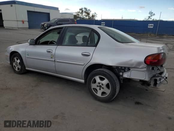 2003 Chevrolet Malibu LS with VIN 1G1NE52J23M633082, listed as a Copart auction lot 79299664 with 149,574 mi miles and Salvage title. Bid and sale history available at DreamBid. Image 2.