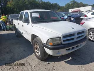 2002 Dodge Dakota Sport z VIN 1B7HL38N92S558657, wystawiony jako IAAI lot #43195470 z przebiegiem 204 245 mil mil oraz . Historia ofert i sprzedaży dostępna na DreamBid. Obrazek 1.