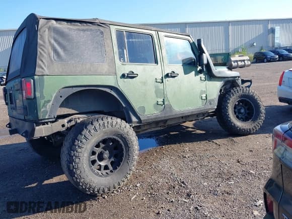 ✅ 2008 Jeep Wrangler Unlimited X • VIN: 1J4GA39198L612727 • Lot: 40128925. Listed on IAAI with 260,573 mi. Free auction sales archive from the USA and detailed vehicle history report at DreamBid. Image 4.