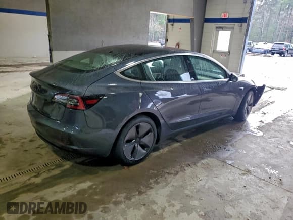 ✅ 2018 Tesla Model 3 Long Range Battery • VIN: 5YJ3E1EB5JF074953 • Лот: 94167505. Опубликован ранее на Copart с пробегом 62 380 миль. Бесплатный доступ к архиву аукционных продаж из США и подробный отчёт об истории автомобиля на DreamBid. Изображение 3.