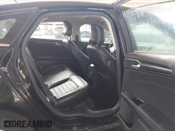 ✅ 2016 Ford Fusion SE Hybrid • VIN: 3FA6P0LU3GR127202 • Lot: 43061240. Wystawiony na IAAI z przebiegiem 196 916 mil. Bezpłatny archiwum sprzedaży aukcyjnych z USA i szczegółowy raport historii pojazdu na DreamBid. Zdjęcie 8.