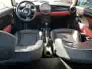 2011 MINI Hardtop with VIN WMWSU3C58BT183765, listed as a Copart auction lot 63061405 with 59,902 mi miles and Salvage title. Bid and sale history available at DreamBid. Image 8.