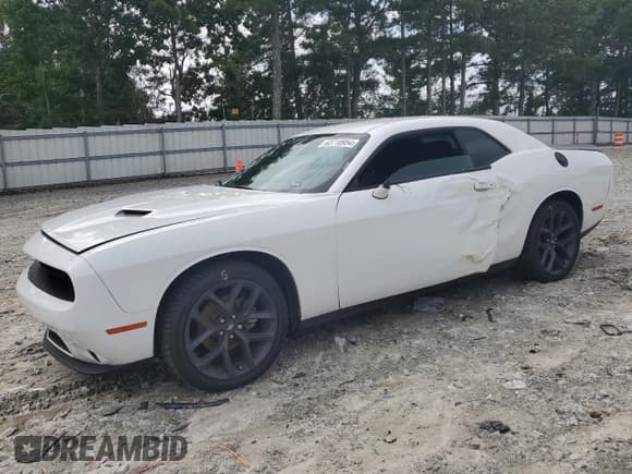 ✅ 2021 Dodge Challenger SXT • VIN: 2C3CDZAG4MH597323 • Lot: 63710954. Wystawiony na Copart z przebiegiem 40 779 mil. Bezpłatny archiwum sprzedaży aukcyjnych z USA i szczegółowy raport historii pojazdu na DreamBid. Zdjęcie 1.