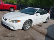 ✅ 1999 Pontiac Grand Prix GTP • VIN: 1G2WR5215XF312975 • Lot: 39985242. Listed on IAAI with 243,125 mi. Free auction sales archive from the USA and detailed vehicle history report at DreamBid. Image 2.