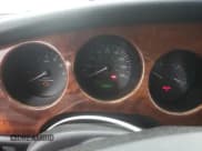 ✅ 2000 Jaguar XK • VIN: SAJJA41B6YPA01802 • Lot: 57146745. Listed on Copart with 32,208 mi. Free auction sales archive from the USA and detailed vehicle history report at DreamBid. Image 9.