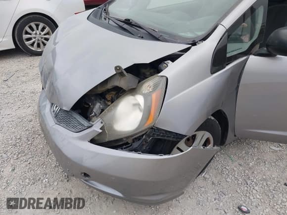 ✅ 2009 Honda Fit • VIN: JHMGE88289C006532 • Lot: 43027357. Listed on IAAI with 208,240 mi. Free auction sales archive from the USA and detailed vehicle history report at DreamBid. Image 12.