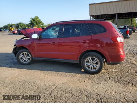 ✅ 2012 Hyundai Santa Fe GLS • VIN: 5XYZG4AG5CG112670 • Lot: 68135674. Listed on Copart with Not provided. Free auction sales archive from the USA and detailed vehicle history report at DreamBid. Image 2.