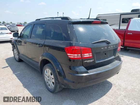 2018 Dodge Journey SE с VIN 3C4PDCAB8JT496058, выставлен на аукционе IAAI как лот 43088149 с пробегом 123 486 миль миль и . История ставок и продаж доступна на DreamBid. Изображение 3.