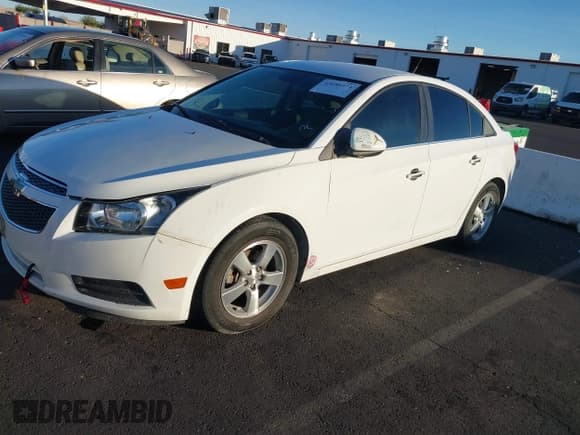 ✅ 2014 Chevrolet Cruze 1LT • VIN: 1G1PC5SB6E7299339 • Lot: 43680374. Listed on IAAI with 98,677 mi. Free auction sales archive from the USA and detailed vehicle history report at DreamBid. Image 6.