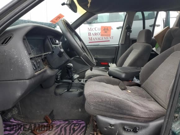 ✅ 1997 Jeep Grand Cherokee Laredo • VIN: 1J4GZ58S5VC720174 • Лот: 44169635. Опубликован ранее на Copart с пробегом Не указан. Бесплатный доступ к архиву аукционных продаж из США и подробный отчёт об истории автомобиля на DreamBid. Изображение 7.