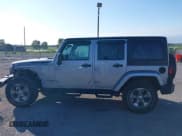 ✅ 2018 Jeep Wrangler Unlimited Sahara • VIN: 1C4HJWEG7JL893986 • Lot: 40114087. Listed on IAAI with 48,815 mi. Free auction sales archive from the USA and detailed vehicle history report at DreamBid. Image 14.
