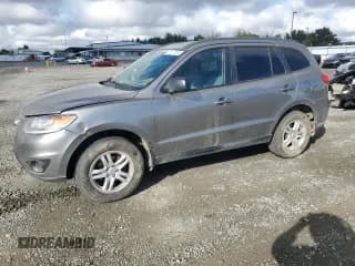 ✅ 2012 Hyundai Santa Fe GLS • VIN: 5XYZGDAB7CG164774 • Lot: 78517034. Listed on Copart with 267,198 mi. Free auction sales archive from the USA and detailed vehicle history report at DreamBid. Image 1.