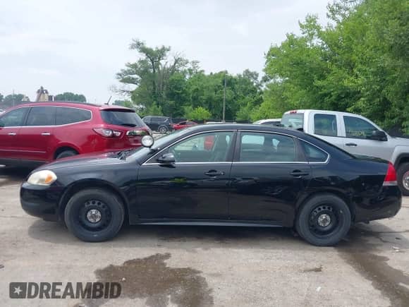 2013 Chevrolet Impala Police with VIN 2G1WD5E39D1263394, listed as a IAAI auction lot 42383103 with 113,929 mi miles and . Bid and sale history available at DreamBid. Image 14.