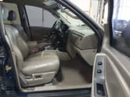 ✅ 2004 Jeep Grand Cherokee Laredo • VIN: 1J4GW48N34C323803 • Lot: 43519623. Listed on IAAI with 179,258 mi. Free auction sales archive from the USA and detailed vehicle history report at DreamBid. Image 5.