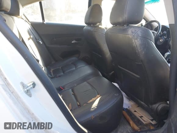 ✅ 2014 Chevrolet Cruze 2LT • VIN: 1G1PE5SB0E7418528 • Lot: 43525230. Listed on IAAI with 89,999 mi. Free auction sales archive from the USA and detailed vehicle history report at DreamBid. Image 8.