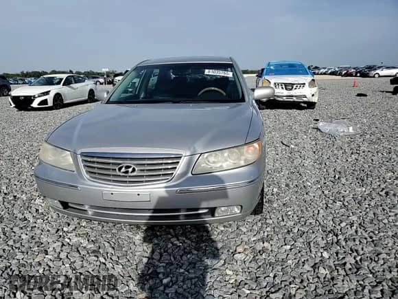 2006 Hyundai Azera SE с VIN KMHFC46F96A037972, выставлен на аукционе Copart как лот 61035765 с пробегом 140 857 миль миль и Списание • Salvage title. История ставок и продаж доступна на DreamBid. Изображение 13.