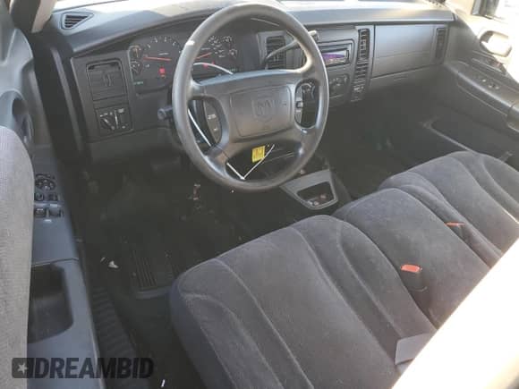 2003 Dodge Dakota Sport z VIN 1D7HL32X63S141658, wystawiony jako Copart lot #85207614 z przebiegiem 147 920 mil mil oraz Czysty tytuł • Clean title. Historia ofert i sprzedaży dostępna na DreamBid. Obrazek 8.