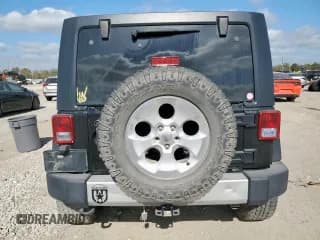 ✅ 2015 Jeep Wrangler Unlimited Sahara • VIN: 1C4HJWEGXFL624906 • Лот: 91418085. Опубликован ранее на Copart с пробегом 206 272 миль. Бесплатный доступ к архиву аукционных продаж из США и подробный отчёт об истории автомобиля на DreamBid. Изображение 6.