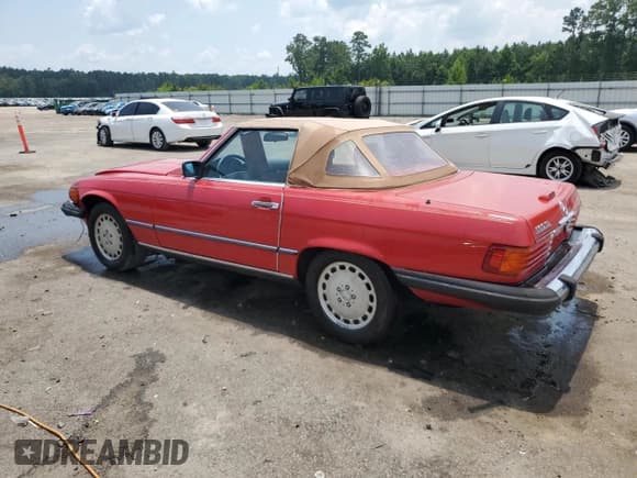 ✅ 1989 Mercedes-Benz 560 SL • VIN: WDBBA48D0KA104374 • Lot: 61547645. Wystawiony na Copart z przebiegiem 96 577 mil. Bezpłatny archiwum sprzedaży aukcyjnych z USA i szczegółowy raport historii pojazdu na DreamBid. Zdjęcie 2.