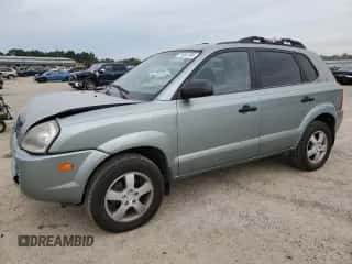 2006 Hyundai Tucson GL z VIN KM8JM72B26U292618, wystawiony jako Copart lot #71381784 z przebiegiem 208 371 mil mil oraz Szkoda całkowita • Salvage title. Historia ofert i sprzedaży dostępna na DreamBid. Obrazek 1.