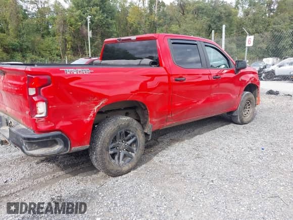 2021 Chevrolet Silverado 1500 LT Trail Boss z VIN 3GCPYFED1MG451154, wystawiony jako IAAI lot #43289477 z przebiegiem 87 234 mil mil oraz . Historia ofert i sprzedaży dostępna na DreamBid. Obrazek 4.