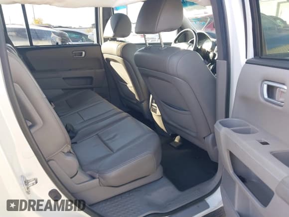 ✅ 2013 Honda Pilot Touring • VIN: 5FNYF4H90DB001880 • Lot: 43519244. Listed on IAAI with 199,875 mi. Free auction sales archive from the USA and detailed vehicle history report at DreamBid. Image 8.
