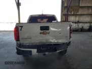 ✅ 2016 Chevrolet Colorado 2WD LT • VIN: 1GCGSCE35G1301512 • Лот: 74588164. Опубликован ранее на Copart с пробегом 129 468 миль. Бесплатный доступ к архиву аукционных продаж из США и подробный отчёт об истории автомобиля на DreamBid. Изображение 6.