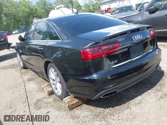 ✅ 2017 Audi A6 • VIN: WAUG8BFC8HN018925 • Lot: 42545755. Listed on IAAI with 123,969 mi. Free auction sales archive from the USA and detailed vehicle history report at DreamBid. Image 3.