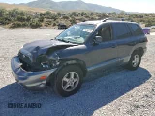 2004 Hyundai Santa Fe GLS z VIN KM8SC73E64U785036, wystawiony jako Copart lot #61242235 z przebiegiem 213 544 mil mil oraz Szkoda całkowita • Salvage title. Historia ofert i sprzedaży dostępna na DreamBid. Obrazek 1.