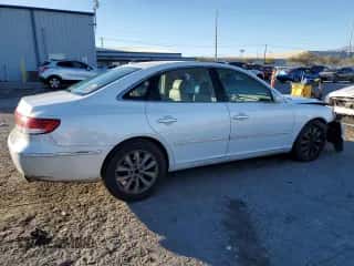 2007 Hyundai Azera SE с VIN KMHFC46F77A238884, выставлен на аукционе Copart как лот 88598615 с пробегом 153 755 миль миль и Списание • Salvage title. История ставок и продаж доступна на DreamBid. Изображение 3.